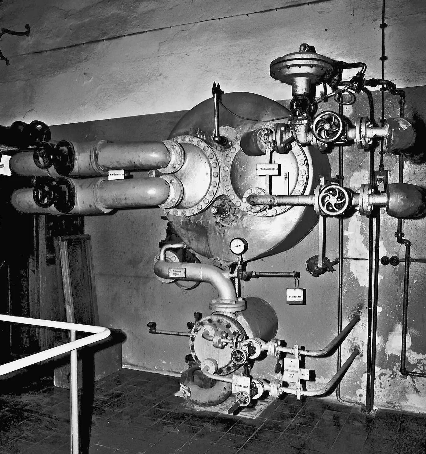 Mechanical room with boiler and heating pipes
